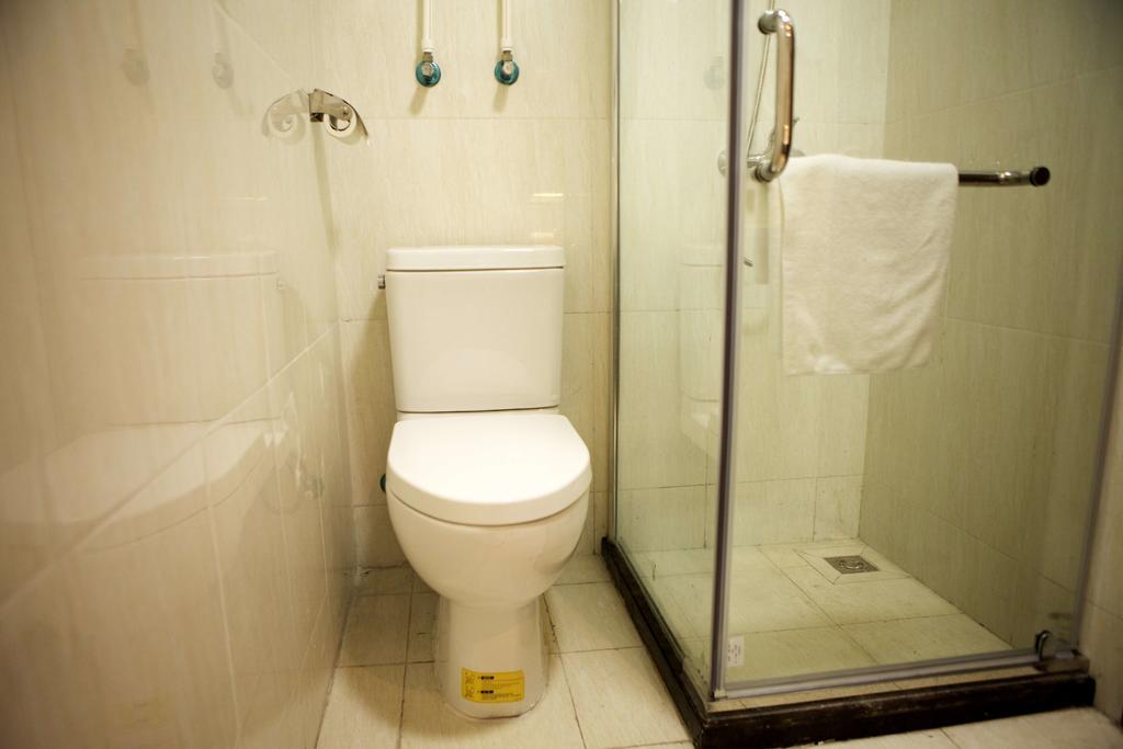 Guangzhou Yi Long International Apartment Kamer foto